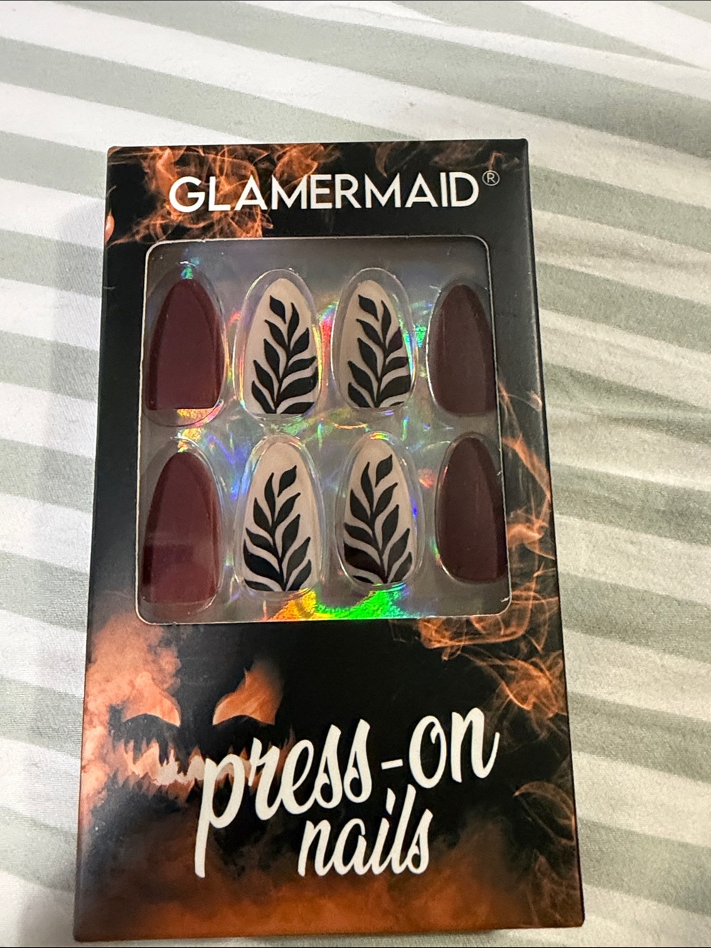 Burgundy and Cream Press-On Nails with Black Leaf Design